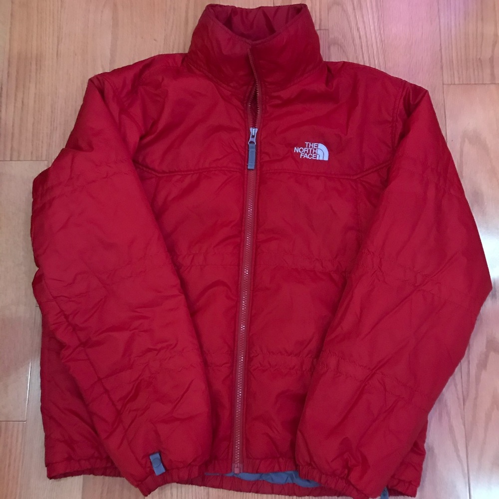 The North Face red jacket